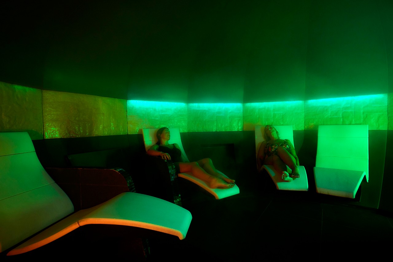 Two ladies laid back in the Mineral Room.